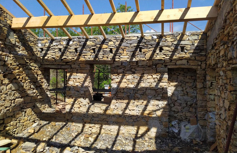 Salvaging materials Meet the architects who transformed a 100-year-old ruin into a sustainable home, A meeting of minds, Shopping for a home, Rescuing a ruin, Crumbling but charming, Getting started, Seven garden terraces, Moving inside, Dismantling the roof, Remains of a ruin, Structural issues, Rebuilding the roof, Salvaging materials, Sealing the roof, Old meets new, Eco materials, Starting on the floors, Creating rooms, Insulation, insulation, insulation, Custom windows, Getting airtight, Plastering problems, Dressing the stone, Let there be light!, Laying the floors, Creating a cosy living room, A welcoming living space, Perfect for entertaining, DIY kitchen, An eco-conscious cooking spot, Polished bathroom walls, Ready for a spa session, A reclaimed patio, Breathtaking backyard views, Olives and lavender