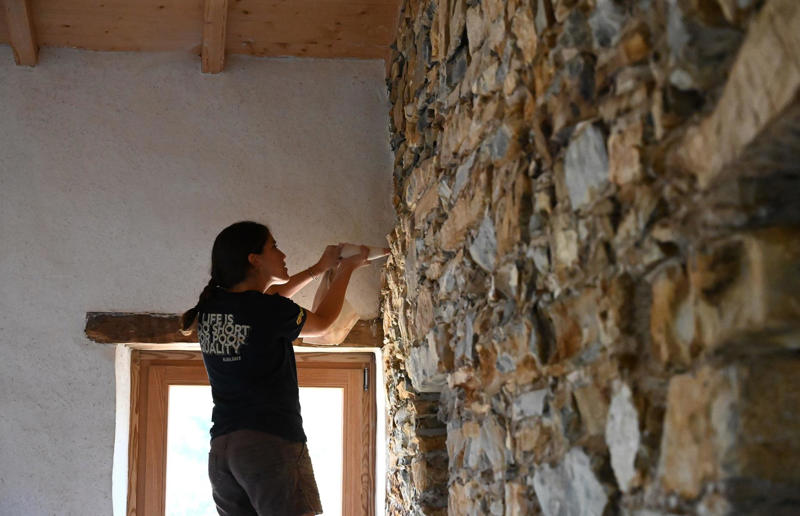 Dressing the stone Meet the architects who transformed a 100-year-old ruin into a sustainable home, A meeting of minds, Shopping for a home, Rescuing a ruin, Crumbling but charming, Getting started, Seven garden terraces, Moving inside, Dismantling the roof, Remains of a ruin, Structural issues, Rebuilding the roof, Salvaging materials, Sealing the roof, Old meets new, Eco materials, Starting on the floors, Creating rooms, Insulation, insulation, insulation, Custom windows, Getting airtight, Plastering problems, Dressing the stone, Let there be light!, Laying the floors, Creating a cosy living room, A welcoming living space, Perfect for entertaining, DIY kitchen, An eco-conscious cooking spot, Polished bathroom walls, Ready for a spa session, A reclaimed patio, Breathtaking backyard views, Olives and lavender
