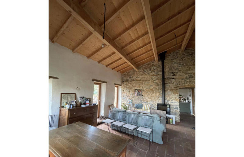 A welcoming living space Meet the architects who transformed a 100-year-old ruin into a sustainable home, A meeting of minds, Shopping for a home, Rescuing a ruin, Crumbling but charming, Getting started, Seven garden terraces, Moving inside, Dismantling the roof, Remains of a ruin, Structural issues, Rebuilding the roof, Salvaging materials, Sealing the roof, Old meets new, Eco materials, Starting on the floors, Creating rooms, Insulation, insulation, insulation, Custom windows, Getting airtight, Plastering problems, Dressing the stone, Let there be light!, Laying the floors, Creating a cosy living room, A welcoming living space, Perfect for entertaining, DIY kitchen, An eco-conscious cooking spot, Polished bathroom walls, Ready for a spa session, A reclaimed patio, Breathtaking backyard views, Olives and lavender