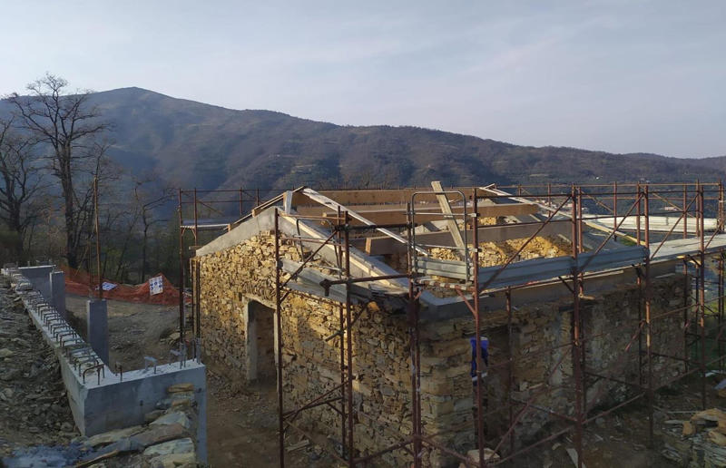 Rebuilding the roof Meet the architects who transformed a 100-year-old ruin into a sustainable home, A meeting of minds, Shopping for a home, Rescuing a ruin, Crumbling but charming, Getting started, Seven garden terraces, Moving inside, Dismantling the roof, Remains of a ruin, Structural issues, Rebuilding the roof, Salvaging materials, Sealing the roof, Old meets new, Eco materials, Starting on the floors, Creating rooms, Insulation, insulation, insulation, Custom windows, Getting airtight, Plastering problems, Dressing the stone, Let there be light!, Laying the floors, Creating a cosy living room, A welcoming living space, Perfect for entertaining, DIY kitchen, An eco-conscious cooking spot, Polished bathroom walls, Ready for a spa session, A reclaimed patio, Breathtaking backyard views, Olives and lavender