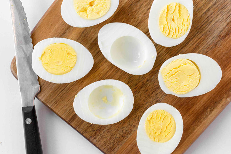How To Safely Store Hard Boiled Eggs, How To Tell the Difference Between Raw and Boiled Eggs, Are Stinky Hard Boiled Eggs Safe To Eat?, Can You Freeze Hard Boiled Eggs For Longer Storage?, Our Favorite Hard Boiled Egg Recipes
