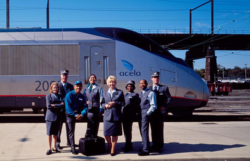 2000s: Amtrak employees in front of the new Acela Express train Rail travel through the ages, 1860s: Royals embrace train travel, 1870s: An early railroad bridge in Arizona, 1880s: Luxurious interior of a railroad car, 1880s: First transcontinental train in Canada, 1890s: Dining car on the Chicago Great Western Limited, 1890s: Barber shop on board a train, 1900s: All about comfort, 1910s: Royals on tour, 1910s: Train travel for everyone, 1910s: Darjeeling Himalayan Railway loop, 1920s: First non-stop service of the Flying Scotsman, 1920s: Swedish State Railways Second Class, 1920s: New entertainment on board, 1930s: Films on trains, 1920s: Holiday rush, 1930s: Sleeping in comfort, 1930s: Battling baggage, 1930s: Summer holidays in the Austrian countryside, 1940s: Long-haul journeys in comfort, 1940s: New luxury trains, 1950s: Lounge on the Southern Pacific Sunset Limited, 1960s: A dream of Eurotunnel, 1960s: High-speed rail travel is unveiled in Japan, 1970s: Dome car of the Southwest Limited, 1970s: The inaugural journey of the Indian Pacific, 1970s: Final journey of the Orient Express, 1980s: Business on the go, 1990s: Passengers en route to the Royal Ascot, 1990s: The late Queen Elizabeth II and Prince Philip aboard Eurostar, 2000s: Amtrak employees in front of the new Acela Express train, 2000s: Aboard the American Orient Express, 2010s: High-speed train travel in China