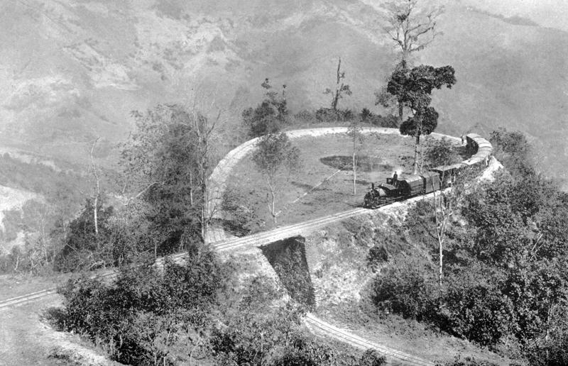 1910s: Darjeeling Himalayan Railway loop Rail travel through the ages, 1860s: Royals embrace train travel, 1870s: An early railroad bridge in Arizona, 1880s: Luxurious interior of a railroad car, 1880s: First transcontinental train in Canada, 1890s: Dining car on the Chicago Great Western Limited, 1890s: Barber shop on board a train, 1900s: All about comfort, 1910s: Royals on tour, 1910s: Train travel for everyone, 1910s: Darjeeling Himalayan Railway loop, 1920s: First non-stop service of the Flying Scotsman, 1920s: Swedish State Railways Second Class, 1920s: New entertainment on board, 1930s: Films on trains, 1920s: Holiday rush, 1930s: Sleeping in comfort, 1930s: Battling baggage, 1930s: Summer holidays in the Austrian countryside, 1940s: Long-haul journeys in comfort, 1940s: New luxury trains, 1950s: Lounge on the Southern Pacific Sunset Limited, 1960s: A dream of Eurotunnel, 1960s: High-speed rail travel is unveiled in Japan, 1970s: Dome car of the Southwest Limited, 1970s: The inaugural journey of the Indian Pacific, 1970s: Final journey of the Orient Express, 1980s: Business on the go, 1990s: Passengers en route to the Royal Ascot, 1990s: The late Queen Elizabeth II and Prince Philip aboard Eurostar, 2000s: Amtrak employees in front of the new Acela Express train, 2000s: Aboard the American Orient Express, 2010s: High-speed train travel in China