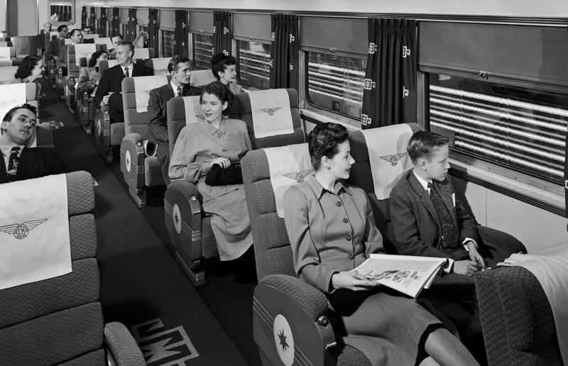 1940s: long-haul journeys in comfort Rail travel through the ages, 1860s: Royals embrace train travel, 1870s: An early railroad bridge in Arizona, 1880s: Luxurious interior of a railroad car, 1880s: First transcontinental train in Canada, 1890s: Dining car on the Chicago Great Western Limited, 1890s: Barber shop on board a train, 1900s: All about comfort, 1910s: Royals on tour, 1910s: Train travel for everyone, 1910s: Darjeeling Himalayan Railway loop, 1920s: First non-stop service of the Flying Scotsman, 1920s: Swedish State Railways Second Class, 1920s: New entertainment on board, 1930s: Films on trains, 1920s: Holiday rush, 1930s: Sleeping in comfort, 1930s: Battling baggage, 1930s: Summer holidays in the Austrian countryside, 1940s: Long-haul journeys in comfort, 1940s: New luxury trains, 1950s: Lounge on the Southern Pacific Sunset Limited, 1960s: A dream of Eurotunnel, 1960s: High-speed rail travel is unveiled in Japan, 1970s: Dome car of the Southwest Limited, 1970s: The inaugural journey of the Indian Pacific, 1970s: Final journey of the Orient Express, 1980s: Business on the go, 1990s: Passengers en route to the Royal Ascot, 1990s: The late Queen Elizabeth II and Prince Philip aboard Eurostar, 2000s: Amtrak employees in front of the new Acela Express train, 2000s: Aboard the American Orient Express, 2010s: High-speed train travel in China