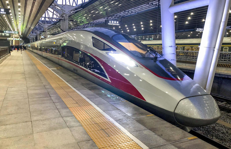 2010s: high-speed train travel in China Rail travel through the ages, 1860s: Royals embrace train travel, 1870s: An early railroad bridge in Arizona, 1880s: Luxurious interior of a railroad car, 1880s: First transcontinental train in Canada, 1890s: Dining car on the Chicago Great Western Limited, 1890s: Barber shop on board a train, 1900s: All about comfort, 1910s: Royals on tour, 1910s: Train travel for everyone, 1910s: Darjeeling Himalayan Railway loop, 1920s: First non-stop service of the Flying Scotsman, 1920s: Swedish State Railways Second Class, 1920s: New entertainment on board, 1930s: Films on trains, 1920s: Holiday rush, 1930s: Sleeping in comfort, 1930s: Battling baggage, 1930s: Summer holidays in the Austrian countryside, 1940s: Long-haul journeys in comfort, 1940s: New luxury trains, 1950s: Lounge on the Southern Pacific Sunset Limited, 1960s: A dream of Eurotunnel, 1960s: High-speed rail travel is unveiled in Japan, 1970s: Dome car of the Southwest Limited, 1970s: The inaugural journey of the Indian Pacific, 1970s: Final journey of the Orient Express, 1980s: Business on the go, 1990s: Passengers en route to the Royal Ascot, 1990s: The late Queen Elizabeth II and Prince Philip aboard Eurostar, 2000s: Amtrak employees in front of the new Acela Express train, 2000s: Aboard the American Orient Express, 2010s: High-speed train travel in China
