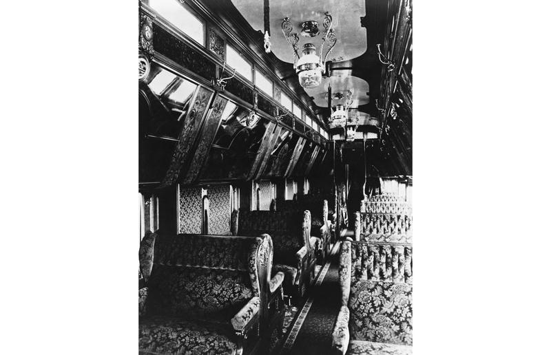 1880s: luxurious interior of a railroad car Rail travel through the ages, 1860s: Royals embrace train travel, 1870s: An early railroad bridge in Arizona, 1880s: Luxurious interior of a railroad car, 1880s: First transcontinental train in Canada, 1890s: Dining car on the Chicago Great Western Limited, 1890s: Barber shop on board a train, 1900s: All about comfort, 1910s: Royals on tour, 1910s: Train travel for everyone, 1910s: Darjeeling Himalayan Railway loop, 1920s: First non-stop service of the Flying Scotsman, 1920s: Swedish State Railways Second Class, 1920s: New entertainment on board, 1930s: Films on trains, 1920s: Holiday rush, 1930s: Sleeping in comfort, 1930s: Battling baggage, 1930s: Summer holidays in the Austrian countryside, 1940s: Long-haul journeys in comfort, 1940s: New luxury trains, 1950s: Lounge on the Southern Pacific Sunset Limited, 1960s: A dream of Eurotunnel, 1960s: High-speed rail travel is unveiled in Japan, 1970s: Dome car of the Southwest Limited, 1970s: The inaugural journey of the Indian Pacific, 1970s: Final journey of the Orient Express, 1980s: Business on the go, 1990s: Passengers en route to the Royal Ascot, 1990s: The late Queen Elizabeth II and Prince Philip aboard Eurostar, 2000s: Amtrak employees in front of the new Acela Express train, 2000s: Aboard the American Orient Express, 2010s: High-speed train travel in China