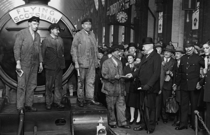 1920s: first non-stop service of the Flying Scotsman Rail travel through the ages, 1860s: Royals embrace train travel, 1870s: An early railroad bridge in Arizona, 1880s: Luxurious interior of a railroad car, 1880s: First transcontinental train in Canada, 1890s: Dining car on the Chicago Great Western Limited, 1890s: Barber shop on board a train, 1900s: All about comfort, 1910s: Royals on tour, 1910s: Train travel for everyone, 1910s: Darjeeling Himalayan Railway loop, 1920s: First non-stop service of the Flying Scotsman, 1920s: Swedish State Railways Second Class, 1920s: New entertainment on board, 1930s: Films on trains, 1920s: Holiday rush, 1930s: Sleeping in comfort, 1930s: Battling baggage, 1930s: Summer holidays in the Austrian countryside, 1940s: Long-haul journeys in comfort, 1940s: New luxury trains, 1950s: Lounge on the Southern Pacific Sunset Limited, 1960s: A dream of Eurotunnel, 1960s: High-speed rail travel is unveiled in Japan, 1970s: Dome car of the Southwest Limited, 1970s: The inaugural journey of the Indian Pacific, 1970s: Final journey of the Orient Express, 1980s: Business on the go, 1990s: Passengers en route to the Royal Ascot, 1990s: The late Queen Elizabeth II and Prince Philip aboard Eurostar, 2000s: Amtrak employees in front of the new Acela Express train, 2000s: Aboard the American Orient Express, 2010s: High-speed train travel in China