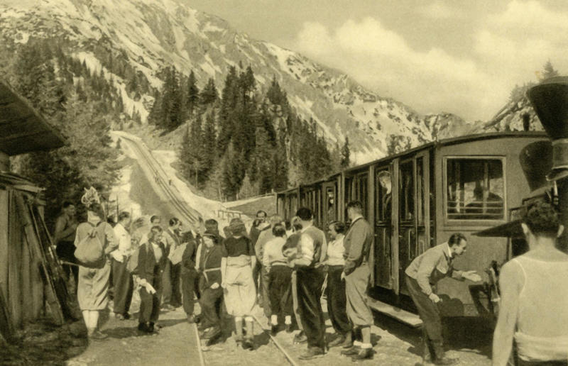 1930s: summer holidays in the Austrian countryside Rail travel through the ages, 1860s: Royals embrace train travel, 1870s: An early railroad bridge in Arizona, 1880s: Luxurious interior of a railroad car, 1880s: First transcontinental train in Canada, 1890s: Dining car on the Chicago Great Western Limited, 1890s: Barber shop on board a train, 1900s: All about comfort, 1910s: Royals on tour, 1910s: Train travel for everyone, 1910s: Darjeeling Himalayan Railway loop, 1920s: First non-stop service of the Flying Scotsman, 1920s: Swedish State Railways Second Class, 1920s: New entertainment on board, 1930s: Films on trains, 1920s: Holiday rush, 1930s: Sleeping in comfort, 1930s: Battling baggage, 1930s: Summer holidays in the Austrian countryside, 1940s: Long-haul journeys in comfort, 1940s: New luxury trains, 1950s: Lounge on the Southern Pacific Sunset Limited, 1960s: A dream of Eurotunnel, 1960s: High-speed rail travel is unveiled in Japan, 1970s: Dome car of the Southwest Limited, 1970s: The inaugural journey of the Indian Pacific, 1970s: Final journey of the Orient Express, 1980s: Business on the go, 1990s: Passengers en route to the Royal Ascot, 1990s: The late Queen Elizabeth II and Prince Philip aboard Eurostar, 2000s: Amtrak employees in front of the new Acela Express train, 2000s: Aboard the American Orient Express, 2010s: High-speed train travel in China