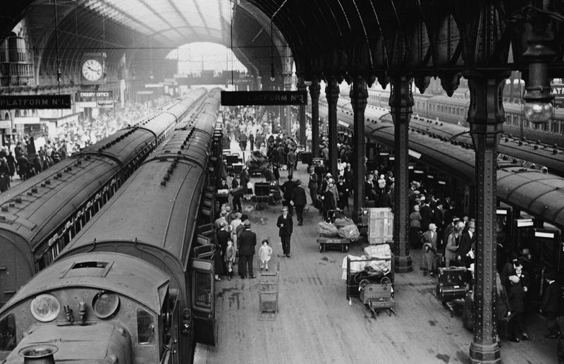 1920s: holiday rush Rail travel through the ages, 1860s: Royals embrace train travel, 1870s: An early railroad bridge in Arizona, 1880s: Luxurious interior of a railroad car, 1880s: First transcontinental train in Canada, 1890s: Dining car on the Chicago Great Western Limited, 1890s: Barber shop on board a train, 1900s: All about comfort, 1910s: Royals on tour, 1910s: Train travel for everyone, 1910s: Darjeeling Himalayan Railway loop, 1920s: First non-stop service of the Flying Scotsman, 1920s: Swedish State Railways Second Class, 1920s: New entertainment on board, 1930s: Films on trains, 1920s: Holiday rush, 1930s: Sleeping in comfort, 1930s: Battling baggage, 1930s: Summer holidays in the Austrian countryside, 1940s: Long-haul journeys in comfort, 1940s: New luxury trains, 1950s: Lounge on the Southern Pacific Sunset Limited, 1960s: A dream of Eurotunnel, 1960s: High-speed rail travel is unveiled in Japan, 1970s: Dome car of the Southwest Limited, 1970s: The inaugural journey of the Indian Pacific, 1970s: Final journey of the Orient Express, 1980s: Business on the go, 1990s: Passengers en route to the Royal Ascot, 1990s: The late Queen Elizabeth II and Prince Philip aboard Eurostar, 2000s: Amtrak employees in front of the new Acela Express train, 2000s: Aboard the American Orient Express, 2010s: High-speed train travel in China