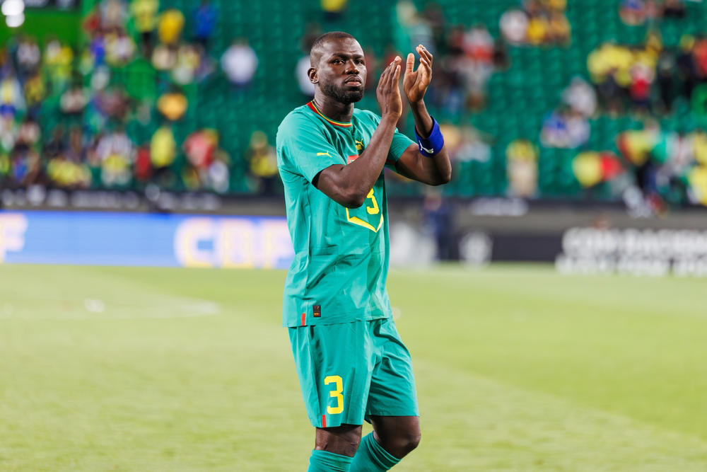 Kalidou Koulibaly (€667,308 per week / €34,700,000 per year) 25. Joško Gvardiol, 24. Kalidou Koulibaly, 22. Jordan Henderson, 21. Roberto Firmino, 20. Marcos Alonso, 18. Joselu, 17. Gabriel Martinelli, 16. Victor Osimhen, 14. Leon Goretzka, 13. Edin Džeko, 12. Bruno Fernandes, 10. Theo Hernández, 9. Didier Drogba, 8. Alphonso Davies, 6. Mohamed Salah, 5. Keylor Navas, 4. Antonio Valencia, 3. Riyad Mahrez, 2. Luka Modrić, 1. Jamie Vardy