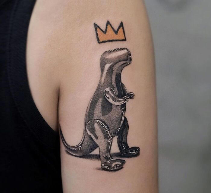 #28 Basquiat Dino #1 Very Colorful Dinosaur, #2 White Stegosaurus Fossil, #4 A Blind Cat Walking His Guiding Velociraptor, #6 Dinosaur Bubble Bath, #7 Dinosaur Sleeve, #8 Gorgeous Work, #9 My Favorite, #10 Ok Google, #11 Furry Little Dinosaur, #12 Super Cute Dino, #13 Siblings' Tattoos, #14 Does Everyone Like Geometric Art? T-Rex Skull, #16 Tattoo Museum, #18 Jungle Dinosaur, #19 Origami T-Rex, #20 My Cartoon Dinosaurs' Tattoo, #21 Dino With Underwater Scene, #22 I Bet This Tea Comes With A Very Special Flavor, #23 Hand-Poked Dinosaur, #24 Yehaaaw, #25 Punk Raptor, #26 Dinos Love Donuts, #27 First Tattoo, #28 Basquiat Dino, #29 We All Live In A Submarine, #30 Raptor. Really Amazing Work, #31 T-Rex Skeleton, #32 Aliens vs. Dinosaurs, #33 T-Rex, #35 Dinosaur Tattoo For Gamers, #37 Uncle Brachiosaurus With His Nephew, #38 Velociraptor, #39 This T-Rex Done By Me, #40 This Guy Is My Neighbor, #41 Dinosaur Sleeve, #42 Walking A T-Rex, #43 Color Realism Velociraptor. Work In Progress, #44 Dinosaur And A Warrior, #46 Just A Man And His Dino