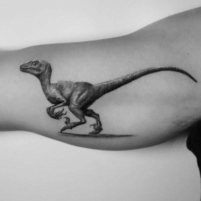 #38 Velociraptor #1 Very Colorful Dinosaur, #2 White Stegosaurus Fossil, #4 A Blind Cat Walking His Guiding Velociraptor, #6 Dinosaur Bubble Bath, #7 Dinosaur Sleeve, #8 Gorgeous Work, #9 My Favorite, #10 Ok Google, #11 Furry Little Dinosaur, #12 Super Cute Dino, #13 Siblings' Tattoos, #14 Does Everyone Like Geometric Art? T-Rex Skull, #16 Tattoo Museum, #18 Jungle Dinosaur, #19 Origami T-Rex, #20 My Cartoon Dinosaurs' Tattoo, #21 Dino With Underwater Scene, #22 I Bet This Tea Comes With A Very Special Flavor, #23 Hand-Poked Dinosaur, #24 Yehaaaw, #25 Punk Raptor, #26 Dinos Love Donuts, #27 First Tattoo, #28 Basquiat Dino, #29 We All Live In A Submarine, #30 Raptor. Really Amazing Work, #31 T-Rex Skeleton, #32 Aliens vs. Dinosaurs, #33 T-Rex, #35 Dinosaur Tattoo For Gamers, #37 Uncle Brachiosaurus With His Nephew, #38 Velociraptor, #39 This T-Rex Done By Me, #40 This Guy Is My Neighbor, #41 Dinosaur Sleeve, #42 Walking A T-Rex, #43 Color Realism Velociraptor. Work In Progress, #44 Dinosaur And A Warrior, #46 Just A Man And His Dino