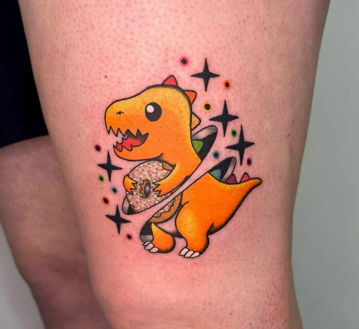 #26 Dinos Love Donuts #1 Very Colorful Dinosaur, #2 White Stegosaurus Fossil, #4 A Blind Cat Walking His Guiding Velociraptor, #6 Dinosaur Bubble Bath, #7 Dinosaur Sleeve, #8 Gorgeous Work, #9 My Favorite, #10 Ok Google, #11 Furry Little Dinosaur, #12 Super Cute Dino, #13 Siblings' Tattoos, #14 Does Everyone Like Geometric Art? T-Rex Skull, #16 Tattoo Museum, #18 Jungle Dinosaur, #19 Origami T-Rex, #20 My Cartoon Dinosaurs' Tattoo, #21 Dino With Underwater Scene, #22 I Bet This Tea Comes With A Very Special Flavor, #23 Hand-Poked Dinosaur, #24 Yehaaaw, #25 Punk Raptor, #26 Dinos Love Donuts, #27 First Tattoo, #28 Basquiat Dino, #29 We All Live In A Submarine, #30 Raptor. Really Amazing Work, #31 T-Rex Skeleton, #32 Aliens vs. Dinosaurs, #33 T-Rex, #35 Dinosaur Tattoo For Gamers, #37 Uncle Brachiosaurus With His Nephew, #38 Velociraptor, #39 This T-Rex Done By Me, #40 This Guy Is My Neighbor, #41 Dinosaur Sleeve, #42 Walking A T-Rex, #43 Color Realism Velociraptor. Work In Progress, #44 Dinosaur And A Warrior, #46 Just A Man And His Dino