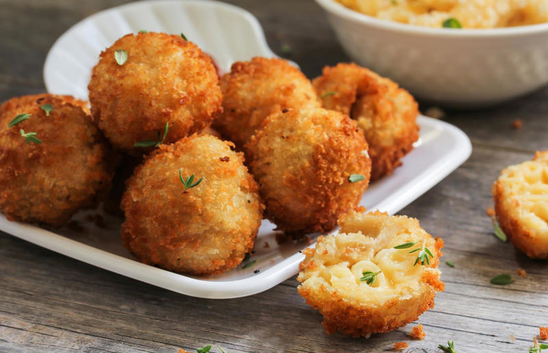 Leftovers: mac 'n' cheese arancini Cheesy does it, A bit about mac 'n' cheese, Shop-bought vs homemade, Go big when it comes to pasta, How to cook the pasta, Why al dente?, Here’s a handy pasta hack, Choosing the right cheese, The sauce, Rescue the sauce: too thin, Rescue the sauce: too thick, Rescue the sauce: too grainy, Upgrade the sauce, The cheat's sauce, Herbs and spices, The final stage, The breadcrumbs, Stovetop version, Three-ingredient mac ‘n’ cheese, Lighter versions, Cheat's slow cooker version, Leftovers: reheating mac 'n' cheese, Leftovers: mac 'n' cheese arancini, Leftovers: mac 'n' cheese toasties, Leftovers: mac 'n' cheese mini pies
