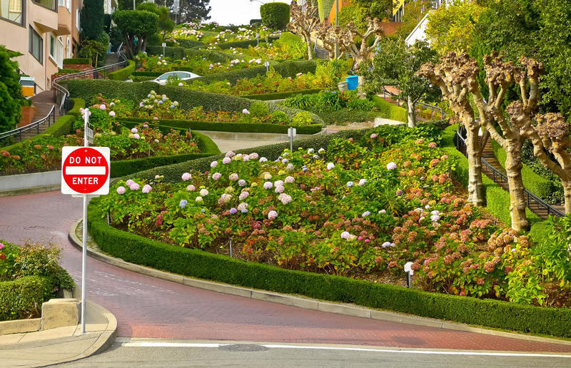 Lombard Street, San Francisco, California, USA 33. 25th Street, Ogden, Utah, USA, 32. Abbey Road, London, England, UK, 31. Heerstraße, Bonn, Germany, 30. Christmas Steps, Bristol, England, UK, 29. Rue du Petit-Champlain, Québec City, Canada, 28. Beale Street, Memphis, Tennessee, USA, 27. Steiner Street, San Francisco, California, USA, 26. Times Square, New York City, New York, USA, 25. Calle Ciegos, Jerez, Spain, 24. Streets of Chefchaouen, Morocco, 23. Avenue des Champs-Élysées, Paris, France, 22. Fiskargränd, Visby, Sweden, 21. Nathan Road, Hong Kong, 20. Nyhavn, Copenhagen, Denmark, 19. Via Dolorosa, Jerusalem, 18. The Royal Mile, Edinburgh, Scotland, UK, 17. Via Giudecca, Burano, Italy, 16. La Rambla, Barcelona, Spain, 15. Herbert Baker Street, Groenkloof, South Africa, 14. Caminito, Buenos Aires, Argentina, 13. Umbrella Sky Project (R. Luís de Camões), Águeda, Portugal, 12. Lombard Street, San Francisco, California, USA, 11. Calleja de las Flores, Córdoba, Spain, 10. Acorn Street, Boston, Massachusetts, USA, 9. Bourbon Street, New Orleans, Louisiana, USA, 8. Streets of Paraty, Brazil, 7. Jinli, Chengdu, China, 6. The Shambles, York, England, UK, 5. Philosopher's Path, Kyoto, Japan, 4. Streets of Alberobello, Italy, 3. Quai de la Poissonnerie, Colmar, France, 2. Via dei Fori Imperiali, Rome, Italy