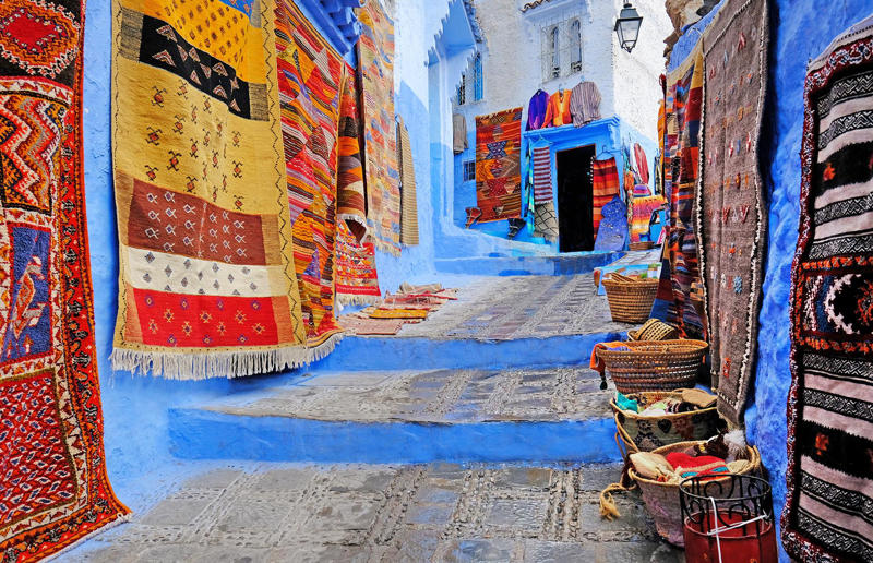 Streets of Chefchaouen, Morocco 33. 25th Street, Ogden, Utah, USA, 32. Abbey Road, London, England, UK, 31. Heerstraße, Bonn, Germany, 30. Christmas Steps, Bristol, England, UK, 29. Rue du Petit-Champlain, Québec City, Canada, 28. Beale Street, Memphis, Tennessee, USA, 27. Steiner Street, San Francisco, California, USA, 26. Times Square, New York City, New York, USA, 25. Calle Ciegos, Jerez, Spain, 24. Streets of Chefchaouen, Morocco, 23. Avenue des Champs-Élysées, Paris, France, 22. Fiskargränd, Visby, Sweden, 21. Nathan Road, Hong Kong, 20. Nyhavn, Copenhagen, Denmark, 19. Via Dolorosa, Jerusalem, 18. The Royal Mile, Edinburgh, Scotland, UK, 17. Via Giudecca, Burano, Italy, 16. La Rambla, Barcelona, Spain, 15. Herbert Baker Street, Groenkloof, South Africa, 14. Caminito, Buenos Aires, Argentina, 13. Umbrella Sky Project (R. Luís de Camões), Águeda, Portugal, 12. Lombard Street, San Francisco, California, USA, 11. Calleja de las Flores, Córdoba, Spain, 10. Acorn Street, Boston, Massachusetts, USA, 9. Bourbon Street, New Orleans, Louisiana, USA, 8. Streets of Paraty, Brazil, 7. Jinli, Chengdu, China, 6. The Shambles, York, England, UK, 5. Philosopher's Path, Kyoto, Japan, 4. Streets of Alberobello, Italy, 3. Quai de la Poissonnerie, Colmar, France, 2. Via dei Fori Imperiali, Rome, Italy