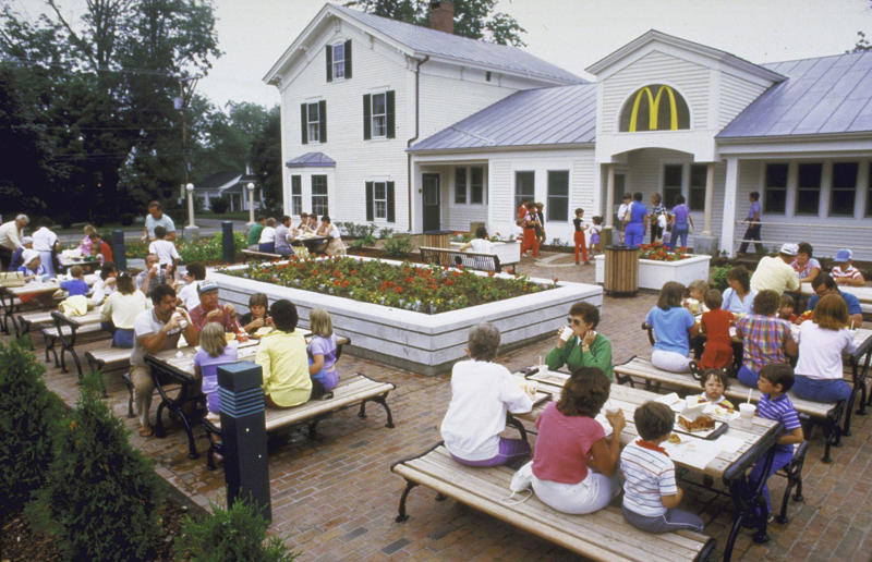 Outdoor space aplenty In pictures: McDonald's in the 1980s, Old-school signage, Differing styles, A move towards simpler signs, A slice of history, Golden exterior, The same, but different, Striking appearances, The rise of the drive-thru, A change in (exterior) pace, City branches, Outdoor space aplenty, Endless fun for kids, A place to hang out, Busy preparation areas, Recycling systems, Menu highlights, Item checklist, The Chicken McNuggets phenomenon, Coupon craze, McDonald’s in Tokyo, Japan, Menus in Tokyo, Japan, Global openings, Colourful uniforms, Service with a smile, Mascots were everywhere, A push for evening meals, Royal window displays, Esteemed guests, Presidential visits