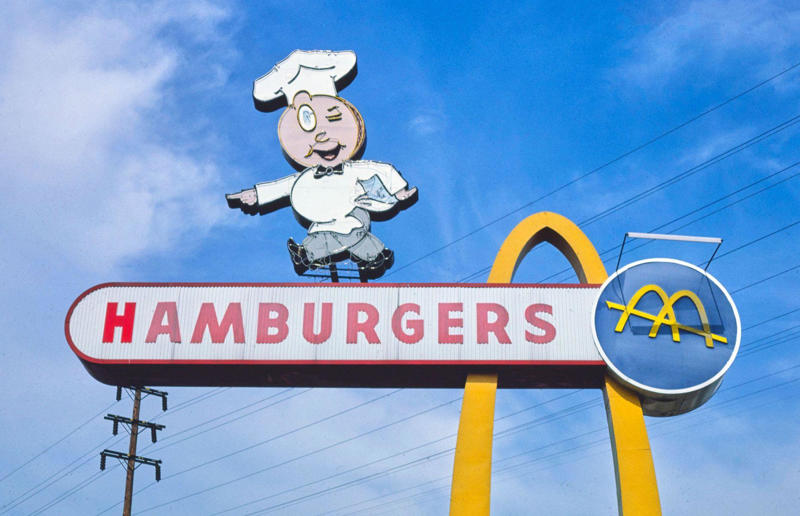 Old-school signage In pictures: McDonald's in the 1980s, Old-school signage, Differing styles, A move towards simpler signs, A slice of history, Golden exterior, The same, but different, Striking appearances, The rise of the drive-thru, A change in (exterior) pace, City branches, Outdoor space aplenty, Endless fun for kids, A place to hang out, Busy preparation areas, Recycling systems, Menu highlights, Item checklist, The Chicken McNuggets phenomenon, Coupon craze, McDonald’s in Tokyo, Japan, Menus in Tokyo, Japan, Global openings, Colourful uniforms, Service with a smile, Mascots were everywhere, A push for evening meals, Royal window displays, Esteemed guests, Presidential visits