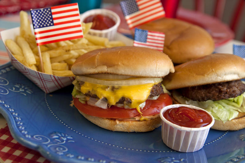 Not exactly an eating contest America: Built by immigrants, Most Americans can trace ancestry to an immigrant, Trump’s immigrant mother and grandparents, Immigrants make America great, Doughnuts, Hamburgers, Basketball, Blue jeans, Levi’s jeans, The telephone, A Scot and an Italian, Overlooked contributions, Russian co-founder, Immigrants in US workforce