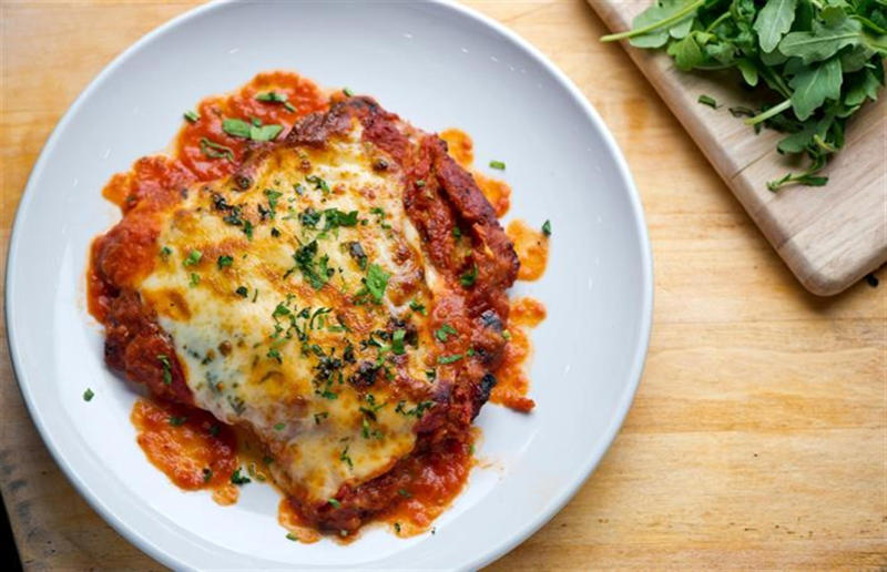 90. Peri peri chicken, Mozambique, 89. Sauerbraten, Germany, 88. Massaman, Thailand, 87. Spanakopita, Cyprus and Greece, 86. Cassoulet, France, 85. Banitsa, Bulgaria, 84. Barramundi, Australia, 83. Pastel de choclo, Chile, 82. Mole, Mexico, 81. Borscht, Ukraine, 80. Plov, Uzbekistan, 79. Bunny chow, South Africa, 78. Käsespätzle/ Käsknöpfle, Central Europe, 77. Chicken rice, Singapore, 76. Adobo, Philippines, 75. Rösti, Switzerland, 74. Falafel, Middle East, 73. Hoppers, Sri Lanka, 72. Nasi lemak, Malaysia, 71. Pupusa, El Salvador, 70. Beef rendang, Indonesia, 69. Tortilla de patatas, Spain, 68. French onion soup, France, 67. Colcannon, Ireland, 66. Bobotie, South Africa, 65. Haggis, Scotland, 64. Tamales, Central and South America, 63. Wiener schnitzel, Austria, 62. Feijoada, Brazil, 61. Souvlaki, Greece, 60. Laksa, Malaysia, 59. Clam chowder, USA, 58. Raclette, Switzerland, 57. Smørrebrød, Denmark, 56. Jollof rice, West Africa, 55. Poutine, Canada, 54. Goulash, Hungary, 53. Pho, Vietnam, 52. Biryani, India, 51. Arepa, Colombia and Venezuela, 50. Shawarma, Middle East, 49. Beef stroganoff, Russia, 48. Som tam, Laos, 47. Cacio e pepe, Italy, 46. Bouillabaisse, France, 45. Khachapuri, Georgia, 44. Ceviche, Peru, 43. Quesadilla, Mexico, 42. Masala dosa, India, 41. Moules frites, Belgium, 40. Köttbullar, Sweden, 39. Welsh rarebit, Wales, 38. Pierogi, Poland, 37. Poke, USA, 36. Tagine, Morocco, 35. Dim sum, China, 34. Gumbo, USA, 33. Kebab, Turkey, 32. Jerk chicken, Jamaica, 31. Singapore noodles, Hong Kong, 30. Asado, Argentina, 29. Beef Wellington, England, 28. Moussaka, Greece, 27. Tahdig, Iran, 26. Murgh makhani, India, 25. Gnocchi, Italy, 24. Sushi, Japan, 23. Texas-style barbecue, USA, 22. Fish and chips, UK, 21. Carbonara, Italy, 20. Tom yum soup, Thailand, 19. Cataplana, Portugal, 18. Mezze, Middle East, 17. Pad Thai, Thailand, 16. Steak frites, France, 15. Shakshuka, Middle East, 14. Tapas, Spain, 13. Gua bao, Taiwan, 12. Boeuf bourguignon, France, 11. Peking duck, China, 10. Chicken parmigiana, USA, 9. Bibimbap, South Korea, 8. Paella, Spain, 7. Tacos, Mexico, 6. Southern fried chicken, USA, 5. Sausage and mash, UK, 4. Ragù alla Bolognese, Italy, 3. Ramen, Japan, 2. Hamburger, USA