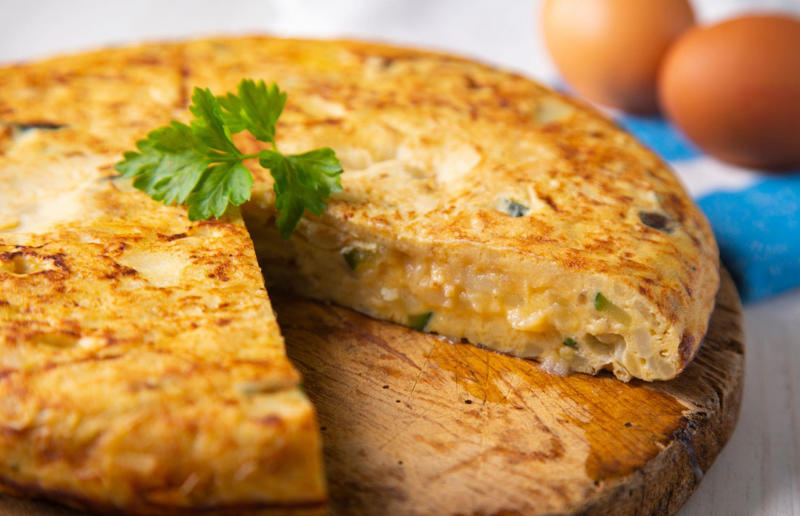 90. Peri peri chicken, Mozambique, 89. Sauerbraten, Germany, 88. Massaman, Thailand, 87. Spanakopita, Cyprus and Greece, 86. Cassoulet, France, 85. Banitsa, Bulgaria, 84. Barramundi, Australia, 83. Pastel de choclo, Chile, 82. Mole, Mexico, 81. Borscht, Ukraine, 80. Plov, Uzbekistan, 79. Bunny chow, South Africa, 78. Käsespätzle/ Käsknöpfle, Central Europe, 77. Chicken rice, Singapore, 76. Adobo, Philippines, 75. Rösti, Switzerland, 74. Falafel, Middle East, 73. Hoppers, Sri Lanka, 72. Nasi lemak, Malaysia, 71. Pupusa, El Salvador, 70. Beef rendang, Indonesia, 69. Tortilla de patatas, Spain, 68. French onion soup, France, 67. Colcannon, Ireland, 66. Bobotie, South Africa, 65. Haggis, Scotland, 64. Tamales, Central and South America, 63. Wiener schnitzel, Austria, 62. Feijoada, Brazil, 61. Souvlaki, Greece, 60. Laksa, Malaysia, 59. Clam chowder, USA, 58. Raclette, Switzerland, 57. Smørrebrød, Denmark, 56. Jollof rice, West Africa, 55. Poutine, Canada, 54. Goulash, Hungary, 53. Pho, Vietnam, 52. Biryani, India, 51. Arepa, Colombia and Venezuela, 50. Shawarma, Middle East, 49. Beef stroganoff, Russia, 48. Som tam, Laos, 47. Cacio e pepe, Italy, 46. Bouillabaisse, France, 45. Khachapuri, Georgia, 44. Ceviche, Peru, 43. Quesadilla, Mexico, 42. Masala dosa, India, 41. Moules frites, Belgium, 40. Köttbullar, Sweden, 39. Welsh rarebit, Wales, 38. Pierogi, Poland, 37. Poke, USA, 36. Tagine, Morocco, 35. Dim sum, China, 34. Gumbo, USA, 33. Kebab, Turkey, 32. Jerk chicken, Jamaica, 31. Singapore noodles, Hong Kong, 30. Asado, Argentina, 29. Beef Wellington, England, 28. Moussaka, Greece, 27. Tahdig, Iran, 26. Murgh makhani, India, 25. Gnocchi, Italy, 24. Sushi, Japan, 23. Texas-style barbecue, USA, 22. Fish and chips, UK, 21. Carbonara, Italy, 20. Tom yum soup, Thailand, 19. Cataplana, Portugal, 18. Mezze, Middle East, 17. Pad Thai, Thailand, 16. Steak frites, France, 15. Shakshuka, Middle East, 14. Tapas, Spain, 13. Gua bao, Taiwan, 12. Boeuf bourguignon, France, 11. Peking duck, China, 10. Chicken parmigiana, USA, 9. Bibimbap, South Korea, 8. Paella, Spain, 7. Tacos, Mexico, 6. Southern fried chicken, USA, 5. Sausage and mash, UK, 4. Ragù alla Bolognese, Italy, 3. Ramen, Japan, 2. Hamburger, USA