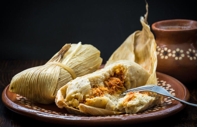 90. Peri peri chicken, Mozambique, 89. Sauerbraten, Germany, 88. Massaman, Thailand, 87. Spanakopita, Cyprus and Greece, 86. Cassoulet, France, 85. Banitsa, Bulgaria, 84. Barramundi, Australia, 83. Pastel de choclo, Chile, 82. Mole, Mexico, 81. Borscht, Ukraine, 80. Plov, Uzbekistan, 79. Bunny chow, South Africa, 78. Käsespätzle/ Käsknöpfle, Central Europe, 77. Chicken rice, Singapore, 76. Adobo, Philippines, 75. Rösti, Switzerland, 74. Falafel, Middle East, 73. Hoppers, Sri Lanka, 72. Nasi lemak, Malaysia, 71. Pupusa, El Salvador, 70. Beef rendang, Indonesia, 69. Tortilla de patatas, Spain, 68. French onion soup, France, 67. Colcannon, Ireland, 66. Bobotie, South Africa, 65. Haggis, Scotland, 64. Tamales, Central and South America, 63. Wiener schnitzel, Austria, 62. Feijoada, Brazil, 61. Souvlaki, Greece, 60. Laksa, Malaysia, 59. Clam chowder, USA, 58. Raclette, Switzerland, 57. Smørrebrød, Denmark, 56. Jollof rice, West Africa, 55. Poutine, Canada, 54. Goulash, Hungary, 53. Pho, Vietnam, 52. Biryani, India, 51. Arepa, Colombia and Venezuela, 50. Shawarma, Middle East, 49. Beef stroganoff, Russia, 48. Som tam, Laos, 47. Cacio e pepe, Italy, 46. Bouillabaisse, France, 45. Khachapuri, Georgia, 44. Ceviche, Peru, 43. Quesadilla, Mexico, 42. Masala dosa, India, 41. Moules frites, Belgium, 40. Köttbullar, Sweden, 39. Welsh rarebit, Wales, 38. Pierogi, Poland, 37. Poke, USA, 36. Tagine, Morocco, 35. Dim sum, China, 34. Gumbo, USA, 33. Kebab, Turkey, 32. Jerk chicken, Jamaica, 31. Singapore noodles, Hong Kong, 30. Asado, Argentina, 29. Beef Wellington, England, 28. Moussaka, Greece, 27. Tahdig, Iran, 26. Murgh makhani, India, 25. Gnocchi, Italy, 24. Sushi, Japan, 23. Texas-style barbecue, USA, 22. Fish and chips, UK, 21. Carbonara, Italy, 20. Tom yum soup, Thailand, 19. Cataplana, Portugal, 18. Mezze, Middle East, 17. Pad Thai, Thailand, 16. Steak frites, France, 15. Shakshuka, Middle East, 14. Tapas, Spain, 13. Gua bao, Taiwan, 12. Boeuf bourguignon, France, 11. Peking duck, China, 10. Chicken parmigiana, USA, 9. Bibimbap, South Korea, 8. Paella, Spain, 7. Tacos, Mexico, 6. Southern fried chicken, USA, 5. Sausage and mash, UK, 4. Ragù alla Bolognese, Italy, 3. Ramen, Japan, 2. Hamburger, USA