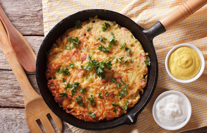 90. Peri peri chicken, Mozambique, 89. Sauerbraten, Germany, 88. Massaman, Thailand, 87. Spanakopita, Cyprus and Greece, 86. Cassoulet, France, 85. Banitsa, Bulgaria, 84. Barramundi, Australia, 83. Pastel de choclo, Chile, 82. Mole, Mexico, 81. Borscht, Ukraine, 80. Plov, Uzbekistan, 79. Bunny chow, South Africa, 78. Käsespätzle/ Käsknöpfle, Central Europe, 77. Chicken rice, Singapore, 76. Adobo, Philippines, 75. Rösti, Switzerland, 74. Falafel, Middle East, 73. Hoppers, Sri Lanka, 72. Nasi lemak, Malaysia, 71. Pupusa, El Salvador, 70. Beef rendang, Indonesia, 69. Tortilla de patatas, Spain, 68. French onion soup, France, 67. Colcannon, Ireland, 66. Bobotie, South Africa, 65. Haggis, Scotland, 64. Tamales, Central and South America, 63. Wiener schnitzel, Austria, 62. Feijoada, Brazil, 61. Souvlaki, Greece, 60. Laksa, Malaysia, 59. Clam chowder, USA, 58. Raclette, Switzerland, 57. Smørrebrød, Denmark, 56. Jollof rice, West Africa, 55. Poutine, Canada, 54. Goulash, Hungary, 53. Pho, Vietnam, 52. Biryani, India, 51. Arepa, Colombia and Venezuela, 50. Shawarma, Middle East, 49. Beef stroganoff, Russia, 48. Som tam, Laos, 47. Cacio e pepe, Italy, 46. Bouillabaisse, France, 45. Khachapuri, Georgia, 44. Ceviche, Peru, 43. Quesadilla, Mexico, 42. Masala dosa, India, 41. Moules frites, Belgium, 40. Köttbullar, Sweden, 39. Welsh rarebit, Wales, 38. Pierogi, Poland, 37. Poke, USA, 36. Tagine, Morocco, 35. Dim sum, China, 34. Gumbo, USA, 33. Kebab, Turkey, 32. Jerk chicken, Jamaica, 31. Singapore noodles, Hong Kong, 30. Asado, Argentina, 29. Beef Wellington, England, 28. Moussaka, Greece, 27. Tahdig, Iran, 26. Murgh makhani, India, 25. Gnocchi, Italy, 24. Sushi, Japan, 23. Texas-style barbecue, USA, 22. Fish and chips, UK, 21. Carbonara, Italy, 20. Tom yum soup, Thailand, 19. Cataplana, Portugal, 18. Mezze, Middle East, 17. Pad Thai, Thailand, 16. Steak frites, France, 15. Shakshuka, Middle East, 14. Tapas, Spain, 13. Gua bao, Taiwan, 12. Boeuf bourguignon, France, 11. Peking duck, China, 10. Chicken parmigiana, USA, 9. Bibimbap, South Korea, 8. Paella, Spain, 7. Tacos, Mexico, 6. Southern fried chicken, USA, 5. Sausage and mash, UK, 4. Ragù alla Bolognese, Italy, 3. Ramen, Japan, 2. Hamburger, USA