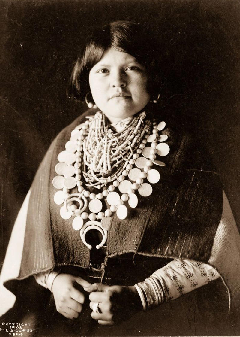 #55 A Zuni Woman, 1903 #1 A Klamath Chief Stands On A Hill Above Crater Lake, Oregon, 1923, #3 A Jicarrilla Girl, C. 1910, #5 An Apsaroke Mother And Child, 1908, #7 A Tewa Girl, 1906, #9 Piegan Tepees, 1910, #11 Mohave Woman, 1903, #13 A Kwakiutl Wedding Party Arrives In Canoes, 1914, #15 Eskadi, Of The Apache Tribe, 1903, #17 A Smoky Day At The Sugar Bowl, 1923, #19 Walpi Maidens, 1906, #21 Navajo Man, 1904, #23 Navajos, 1905, #25 Piegan Girls Gather Goldenrod, 1910, #27 A Hidatsa Man With A Captured Eagle, 1908, #29 Hakalahl, A Nakoaktok Chief, 1914, #31 A Young Member Of The Apache Tribe, C. 1910, #33 Apsaroke Man Wearing Medicine Hawk Headdress, 1908, #35 A Kwakiutl Gatherer Hunts Abalones In Washington, 1910, #37 Kwakiutl People In Canoes In British Columbia, 1914, #39 A Cahuilla Woman, 1924, #41 Members Of The Qagyuhl Tribe Dance To Restore An Eclipsed Moon, C. 1910, #43 Iahla, Also Known As "willow," Of The Taos Pueblo, 1905, #45 A Kutenai Duck Hunter, 1910, #47 A Hupa Woman, 1923, #49 A Maricopa Woman, 1907, #51 Spearing Salmon, 1923, #53 Nayenezgani, A Navajo Man, 1904, #55 A Zuni Woman, 1903, #57 Hopi Bridal Costume, 1900, #59 A Maricopa Woman With Arrow-brush Stalks, 1907, #61 At The Old Well Of Acoma, 1904, #63 A Kwakiutl Shaman, 1914, #65 An Apache Woman Reaps Grain, C. 1910, #67 A Sioux Hunter, 1905, #69 Piegan Chiefs, 1900, #71 Mnainak, A Yakima Chief, 1910
