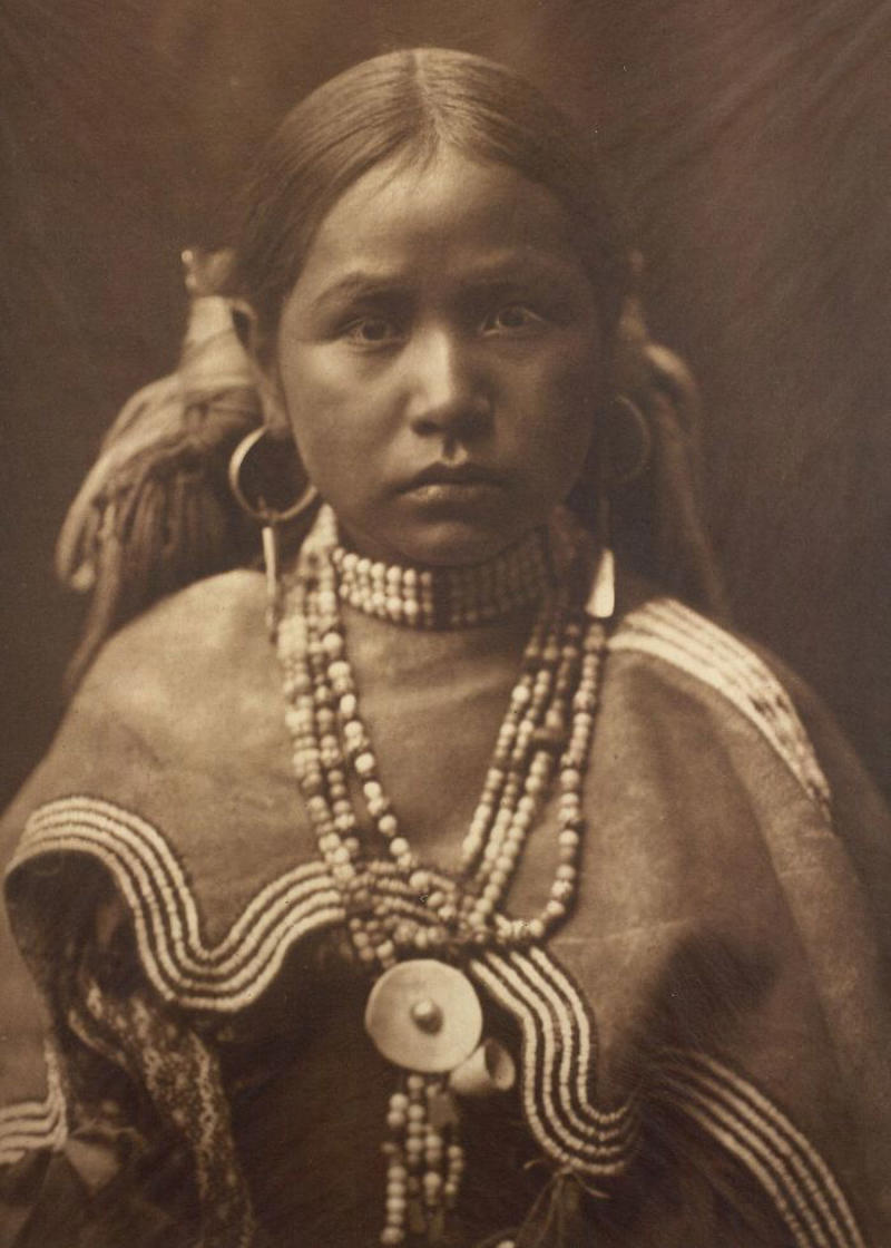 #3 A Jicarrilla Girl, C. 1910 #1 A Klamath Chief Stands On A Hill Above Crater Lake, Oregon, 1923, #3 A Jicarrilla Girl, C. 1910, #5 An Apsaroke Mother And Child, 1908, #7 A Tewa Girl, 1906, #9 Piegan Tepees, 1910, #11 Mohave Woman, 1903, #13 A Kwakiutl Wedding Party Arrives In Canoes, 1914, #15 Eskadi, Of The Apache Tribe, 1903, #17 A Smoky Day At The Sugar Bowl, 1923, #19 Walpi Maidens, 1906, #21 Navajo Man, 1904, #23 Navajos, 1905, #25 Piegan Girls Gather Goldenrod, 1910, #27 A Hidatsa Man With A Captured Eagle, 1908, #29 Hakalahl, A Nakoaktok Chief, 1914, #31 A Young Member Of The Apache Tribe, C. 1910, #33 Apsaroke Man Wearing Medicine Hawk Headdress, 1908, #35 A Kwakiutl Gatherer Hunts Abalones In Washington, 1910, #37 Kwakiutl People In Canoes In British Columbia, 1914, #39 A Cahuilla Woman, 1924, #41 Members Of The Qagyuhl Tribe Dance To Restore An Eclipsed Moon, C. 1910, #43 Iahla, Also Known As "willow," Of The Taos Pueblo, 1905, #45 A Kutenai Duck Hunter, 1910, #47 A Hupa Woman, 1923, #49 A Maricopa Woman, 1907, #51 Spearing Salmon, 1923, #53 Nayenezgani, A Navajo Man, 1904, #55 A Zuni Woman, 1903, #57 Hopi Bridal Costume, 1900, #59 A Maricopa Woman With Arrow-brush Stalks, 1907, #61 At The Old Well Of Acoma, 1904, #63 A Kwakiutl Shaman, 1914, #65 An Apache Woman Reaps Grain, C. 1910, #67 A Sioux Hunter, 1905, #69 Piegan Chiefs, 1900, #71 Mnainak, A Yakima Chief, 1910