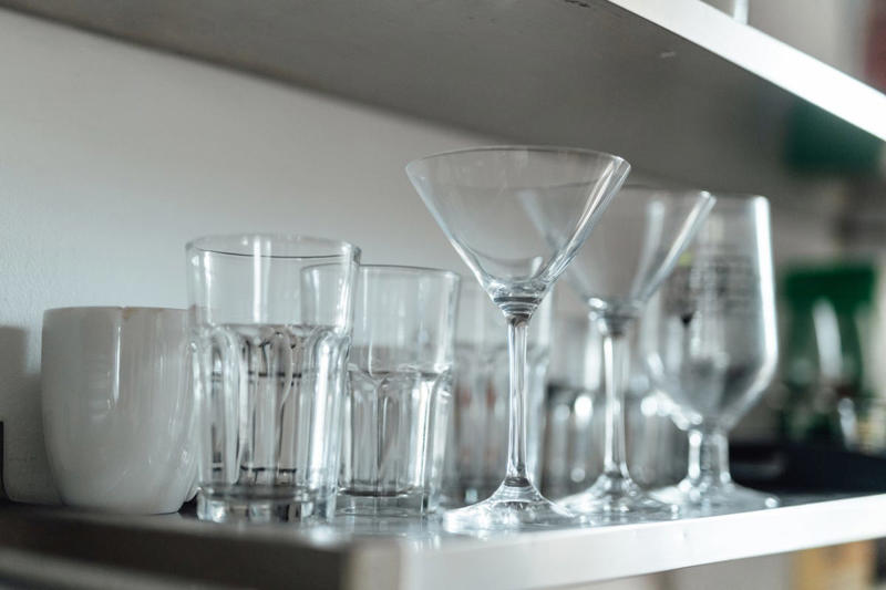 4) Polish Glassware 1) Clean a Cutting Board, 2) Refresh Your Oven Door, 3) Deodorize a Garbage Disposal, 4) Polish Glassware, 5) Make an Air Freshener, 7) Shine Metal, 10) Wipe Down Your Stovetop, 11) Fix Stained Containers, 13) Clean a Cheese Grater, 14) Tackle Build-up on Pots and Pans