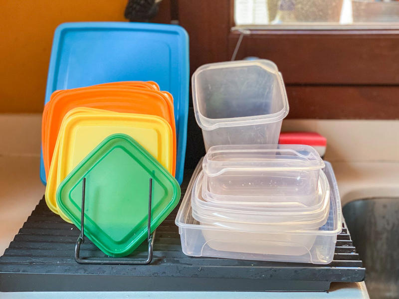 11) Fix Stained Containers 1) Clean a Cutting Board, 2) Refresh Your Oven Door, 3) Deodorize a Garbage Disposal, 4) Polish Glassware, 5) Make an Air Freshener, 7) Shine Metal, 10) Wipe Down Your Stovetop, 11) Fix Stained Containers, 13) Clean a Cheese Grater, 14) Tackle Build-up on Pots and Pans