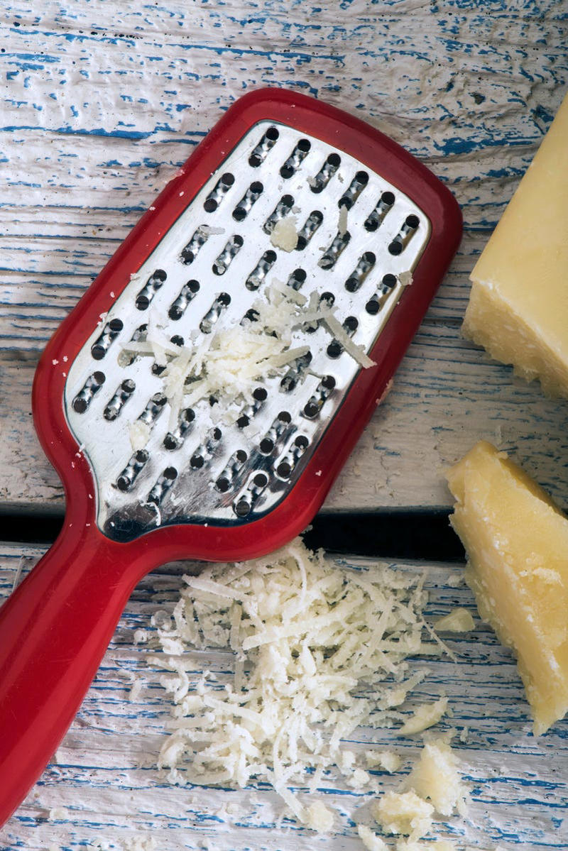 13) Clean a Cheese Grater 1) Clean a Cutting Board, 2) Refresh Your Oven Door, 3) Deodorize a Garbage Disposal, 4) Polish Glassware, 5) Make an Air Freshener, 7) Shine Metal, 10) Wipe Down Your Stovetop, 11) Fix Stained Containers, 13) Clean a Cheese Grater, 14) Tackle Build-up on Pots and Pans