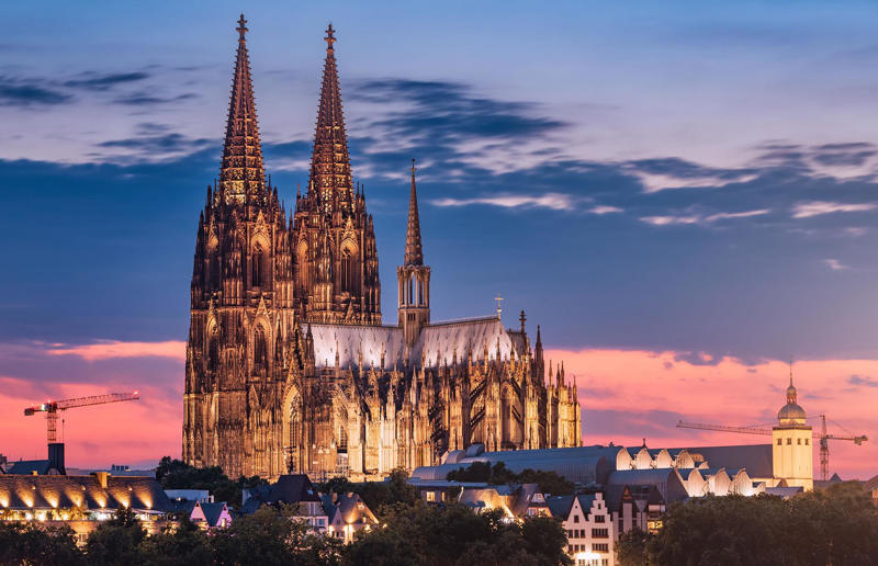 18. Sagrada Familia, Barcelona, Spain, 17. Notre-Dame Basilica, Montreal, Quebec, Canada, 16. The Flatiron, New York City, New York, USA, 15. St Pancras Renaissance Hotel, London, England, UK, 14. Burj Al Arab, Dubai, UAE, 13. The Guggenheim, Bilbao, Spain, 12. Pena Palace, Sintra, Portugal, 11. Neuschwanstein Castle, Bavaria, Germany, 10. Wat Rong Khun, Chiang Rai, Thailand, 9. Hallgrimskirkja, Reykjavík, Iceland, 8. Sydney Opera House, Sydney, New South Wales, Australia, 7. Osaka Castle, Osaka, Japan, 6. Palace of Versailles, Versailles, France, 5. Cologne Cathedral, Cologne, Germany, 4. The Tiger's Nest, Bhutan, 3. Duomo di Milano, Milan, Italy, 2. Taj Mahal, Agra, India, 1. Mont-Saint-Michel, Normandy, France
