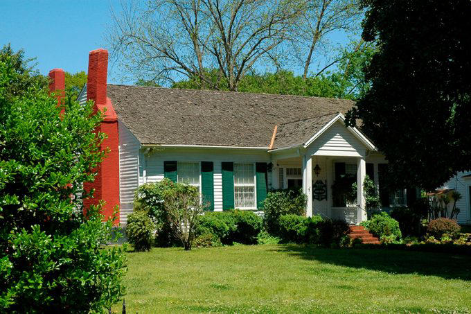 Alabama: Ivy Green, Alaska: Baranof Castle, Arizona: Lowell Observatory, Arkansas: Central High School, California: Alcatraz Island, Colorado: Mesa Verde National Park, Connecticut: The Charles W. Morgan, Delaware: Old Swedes Church, Florida: Venetian Pool, Georgia: Martin Luther King Jr. National Historic Site, Hawaii: Iolani Palace, Idaho: Cataldo Mission, Illinois: Abraham Lincoln Home, Indiana: Soldiers and Sailors Monument, Iowa: Amana Colonies, Kansas: Hollenberg Pony Express Station, Kentucky: Churchill Downs, Louisiana: Cabildo, Maine: Wadsworth-Longfellow House, Maryland: Fort McHenry, Massachusetts: Plymouth Rock, Michigan: Fort Mackinac, Minnesota: Mill City Museum, Mississippi: Old Mississippi State Capitol, Missouri: Anheuser-Busch Brewery, Montana: Butte Historic District, Nebraska: Arbor Lodge State Historical Park, Nevada: Hoover Dam, New Hampshire: Canterbury Shaker Village, New Jersey: Sandy Hook Lighthouse, New Mexico: Palace of the Governors, New York: Ellis Island, North Carolina: Wright Brothers National Memorial, North Dakota: Fort Union Trading Post, Ohio: Cincinnati Zoo, Oklahoma: Honey Springs Battlefield, Oregon: Fort Rock Cave, Pennsylvania: Liberty Bell, Rhode Island: Slater Mill, South Carolina: Fort Sumter, South Dakota: Mount Rushmore, Tennessee: Graceland, Texas: The Alamo, Utah: Temple Square, Vermont: Calvin Coolidge Homestead, Virginia: Arlington National Cemetery, Washington: Chinook Point, West Virginia: The Greenbrier, Wisconsin: Little White Schoolhouse, Wyoming: Independence Rock