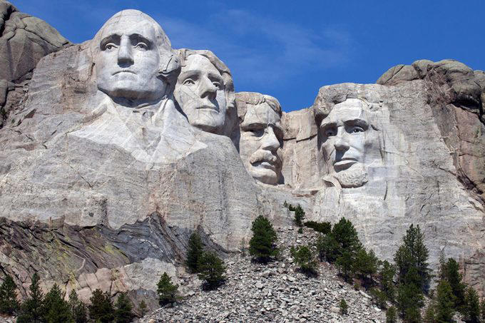 Alabama: Ivy Green, Alaska: Baranof Castle, Arizona: Lowell Observatory, Arkansas: Central High School, California: Alcatraz Island, Colorado: Mesa Verde National Park, Connecticut: The Charles W. Morgan, Delaware: Old Swedes Church, Florida: Venetian Pool, Georgia: Martin Luther King Jr. National Historic Site, Hawaii: Iolani Palace, Idaho: Cataldo Mission, Illinois: Abraham Lincoln Home, Indiana: Soldiers and Sailors Monument, Iowa: Amana Colonies, Kansas: Hollenberg Pony Express Station, Kentucky: Churchill Downs, Louisiana: Cabildo, Maine: Wadsworth-Longfellow House, Maryland: Fort McHenry, Massachusetts: Plymouth Rock, Michigan: Fort Mackinac, Minnesota: Mill City Museum, Mississippi: Old Mississippi State Capitol, Missouri: Anheuser-Busch Brewery, Montana: Butte Historic District, Nebraska: Arbor Lodge State Historical Park, Nevada: Hoover Dam, New Hampshire: Canterbury Shaker Village, New Jersey: Sandy Hook Lighthouse, New Mexico: Palace of the Governors, New York: Ellis Island, North Carolina: Wright Brothers National Memorial, North Dakota: Fort Union Trading Post, Ohio: Cincinnati Zoo, Oklahoma: Honey Springs Battlefield, Oregon: Fort Rock Cave, Pennsylvania: Liberty Bell, Rhode Island: Slater Mill, South Carolina: Fort Sumter, South Dakota: Mount Rushmore, Tennessee: Graceland, Texas: The Alamo, Utah: Temple Square, Vermont: Calvin Coolidge Homestead, Virginia: Arlington National Cemetery, Washington: Chinook Point, West Virginia: The Greenbrier, Wisconsin: Little White Schoolhouse, Wyoming: Independence Rock