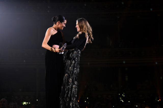 It took 3,900 hours of work by 50 people., Dressmakers had to wash their hands every 30 minutes while making Meghan's 16-foot-veil., Meghan's wedding-day tiara was the last royal tiara she ever wore., The dress featured a hidden, sentimental "something blue.", Meghan's second wedding dress was a Stella McCartney halter gown.