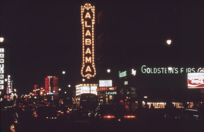 Alabama: Alabama Theatre, Birmingham (1972) Life in the 1970s in every state, Alabama: Alabama Theatre, Birmingham (1972), Alaska: Fishing on Nonvianuk Lake (1973), Arizona: Route 66, Winslow (1979), Arkansas: Testing for pollution in Fort Smith (1973), California: The streets of San Francisco (c.1970), Colorado: Galena Street, Aspen (1974), Connecticut: Collin’s Diner, Canaan (1976), Delaware: Old State House, Dover (1970), Florida: Disney’s Magic Kingdom (1970), Georgia: Farmer ploughing field in Helen (1970), Hawaii: The Brady Bunch in ‘Hawaii Bound’ (1972), Idaho: Camping on Lake Stanley (c.1970s), Illinois: Roller Disco fashion show, Chicago (1979), Indiana: Indianapolis 500 (1973), Iowa: Sergeant John F. Baker Jr. Bridge, Davenport (1972), Kansas: Grain elevator, White Cloud (1974), Kentucky: Miners’ homes, Brookside (1974), Louisiana: Bourbon Street, New Orleans (1976), Maine: Fishing in Cape Elizabeth (1971), Maryland: School excursion to Baltimore harbor (1973), Massachusetts: Haymarket Square, Boston (1973), Michigan: Annual smelt run, Tawas City (1973), Minnesota: SkyRise Terrace, St Paul (1971), Mississippi: Hurricane Camille Gift Shop, Gulfport (1979), Missouri: Tourist information booth, Lake of the Ozarks, Montana: East Glacier Park train station (1974), Nebraska: Sioux tribal dance, North Platte (1970), Nevada: Fremont Street, Las Vegas (c.1970), New Hampshire: Waterville Valley (1972), New Jersey: Seaside Heights boardwalk (1978), New Mexico: Mesa viewpoint (c.1970s), New York: Sightseeing cruise, New York City (c.1970s), North Carolina: Prom queen parade, Huntersville (c.1970s), North Dakota: Arriving at Fargo station (c.1972), Ohio: Aerial view of Toledo (c.1970s), Oklahoma: Oral Roberts University, Tulsa (c.1977), Oregon: Union Station, Portland (1974), Pennsylvania: Street parade, Philadelphia (1976), Rhode Island: Giant milk can, Lincoln (1978), South Carolina: Jungle Golf, Myrtle Beach (1979), South Dakota: Reptile Gardens Wild Animal Park (1975), Tennessee: Interstate 24 near Nashville (1972), Texas: Dallas freeway (1970), Utah: Dead Horse Point, Canyonlands (1972), Vermont: Farm shop (1975), Virginia: Tysons Corner Mall, Tysons Corner (1976), Washington: Seattle skyline (1973), West Virginia: Laundromat, Cedar Grove (1973), Wisconsin: Lake Mendota (1979)