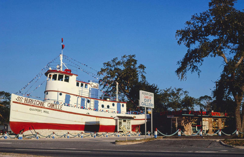 Mississippi: Hurricane Camille Gift Shop, Gulfport (1979) Life in the 1970s in every state, Alabama: Alabama Theatre, Birmingham (1972), Alaska: Fishing on Nonvianuk Lake (1973), Arizona: Route 66, Winslow (1979), Arkansas: Testing for pollution in Fort Smith (1973), California: The streets of San Francisco (c.1970), Colorado: Galena Street, Aspen (1974), Connecticut: Collin’s Diner, Canaan (1976), Delaware: Old State House, Dover (1970), Florida: Disney’s Magic Kingdom (1970), Georgia: Farmer ploughing field in Helen (1970), Hawaii: The Brady Bunch in ‘Hawaii Bound’ (1972), Idaho: Camping on Lake Stanley (c.1970s), Illinois: Roller Disco fashion show, Chicago (1979), Indiana: Indianapolis 500 (1973), Iowa: Sergeant John F. Baker Jr. Bridge, Davenport (1972), Kansas: Grain elevator, White Cloud (1974), Kentucky: Miners’ homes, Brookside (1974), Louisiana: Bourbon Street, New Orleans (1976), Maine: Fishing in Cape Elizabeth (1971), Maryland: School excursion to Baltimore harbor (1973), Massachusetts: Haymarket Square, Boston (1973), Michigan: Annual smelt run, Tawas City (1973), Minnesota: SkyRise Terrace, St Paul (1971), Mississippi: Hurricane Camille Gift Shop, Gulfport (1979), Missouri: Tourist information booth, Lake of the Ozarks, Montana: East Glacier Park train station (1974), Nebraska: Sioux tribal dance, North Platte (1970), Nevada: Fremont Street, Las Vegas (c.1970), New Hampshire: Waterville Valley (1972), New Jersey: Seaside Heights boardwalk (1978), New Mexico: Mesa viewpoint (c.1970s), New York: Sightseeing cruise, New York City (c.1970s), North Carolina: Prom queen parade, Huntersville (c.1970s), North Dakota: Arriving at Fargo station (c.1972), Ohio: Aerial view of Toledo (c.1970s), Oklahoma: Oral Roberts University, Tulsa (c.1977), Oregon: Union Station, Portland (1974), Pennsylvania: Street parade, Philadelphia (1976), Rhode Island: Giant milk can, Lincoln (1978), South Carolina: Jungle Golf, Myrtle Beach (1979), South Dakota: Reptile Gardens Wild Animal Park (1975), Tennessee: Interstate 24 near Nashville (1972), Texas: Dallas freeway (1970), Utah: Dead Horse Point, Canyonlands (1972), Vermont: Farm shop (1975), Virginia: Tysons Corner Mall, Tysons Corner (1976), Washington: Seattle skyline (1973), West Virginia: Laundromat, Cedar Grove (1973), Wisconsin: Lake Mendota (1979)