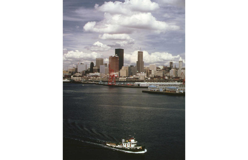 Washington: Seattle skyline (1973) Life in the 1970s in every state, Alabama: Alabama Theatre, Birmingham (1972), Alaska: Fishing on Nonvianuk Lake (1973), Arizona: Route 66, Winslow (1979), Arkansas: Testing for pollution in Fort Smith (1973), California: The streets of San Francisco (c.1970), Colorado: Galena Street, Aspen (1974), Connecticut: Collin’s Diner, Canaan (1976), Delaware: Old State House, Dover (1970), Florida: Disney’s Magic Kingdom (1970), Georgia: Farmer ploughing field in Helen (1970), Hawaii: The Brady Bunch in ‘Hawaii Bound’ (1972), Idaho: Camping on Lake Stanley (c.1970s), Illinois: Roller Disco fashion show, Chicago (1979), Indiana: Indianapolis 500 (1973), Iowa: Sergeant John F. Baker Jr. Bridge, Davenport (1972), Kansas: Grain elevator, White Cloud (1974), Kentucky: Miners’ homes, Brookside (1974), Louisiana: Bourbon Street, New Orleans (1976), Maine: Fishing in Cape Elizabeth (1971), Maryland: School excursion to Baltimore harbor (1973), Massachusetts: Haymarket Square, Boston (1973), Michigan: Annual smelt run, Tawas City (1973), Minnesota: SkyRise Terrace, St Paul (1971), Mississippi: Hurricane Camille Gift Shop, Gulfport (1979), Missouri: Tourist information booth, Lake of the Ozarks, Montana: East Glacier Park train station (1974), Nebraska: Sioux tribal dance, North Platte (1970), Nevada: Fremont Street, Las Vegas (c.1970), New Hampshire: Waterville Valley (1972), New Jersey: Seaside Heights boardwalk (1978), New Mexico: Mesa viewpoint (c.1970s), New York: Sightseeing cruise, New York City (c.1970s), North Carolina: Prom queen parade, Huntersville (c.1970s), North Dakota: Arriving at Fargo station (c.1972), Ohio: Aerial view of Toledo (c.1970s), Oklahoma: Oral Roberts University, Tulsa (c.1977), Oregon: Union Station, Portland (1974), Pennsylvania: Street parade, Philadelphia (1976), Rhode Island: Giant milk can, Lincoln (1978), South Carolina: Jungle Golf, Myrtle Beach (1979), South Dakota: Reptile Gardens Wild Animal Park (1975), Tennessee: Interstate 24 near Nashville (1972), Texas: Dallas freeway (1970), Utah: Dead Horse Point, Canyonlands (1972), Vermont: Farm shop (1975), Virginia: Tysons Corner Mall, Tysons Corner (1976), Washington: Seattle skyline (1973), West Virginia: Laundromat, Cedar Grove (1973), Wisconsin: Lake Mendota (1979)