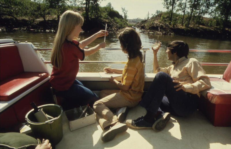 Arkansas: Testing for pollution in Fort Smith (1973) Life in the 1970s in every state, Alabama: Alabama Theatre, Birmingham (1972), Alaska: Fishing on Nonvianuk Lake (1973), Arizona: Route 66, Winslow (1979), Arkansas: Testing for pollution in Fort Smith (1973), California: The streets of San Francisco (c.1970), Colorado: Galena Street, Aspen (1974), Connecticut: Collin’s Diner, Canaan (1976), Delaware: Old State House, Dover (1970), Florida: Disney’s Magic Kingdom (1970), Georgia: Farmer ploughing field in Helen (1970), Hawaii: The Brady Bunch in ‘Hawaii Bound’ (1972), Idaho: Camping on Lake Stanley (c.1970s), Illinois: Roller Disco fashion show, Chicago (1979), Indiana: Indianapolis 500 (1973), Iowa: Sergeant John F. Baker Jr. Bridge, Davenport (1972), Kansas: Grain elevator, White Cloud (1974), Kentucky: Miners’ homes, Brookside (1974), Louisiana: Bourbon Street, New Orleans (1976), Maine: Fishing in Cape Elizabeth (1971), Maryland: School excursion to Baltimore harbor (1973), Massachusetts: Haymarket Square, Boston (1973), Michigan: Annual smelt run, Tawas City (1973), Minnesota: SkyRise Terrace, St Paul (1971), Mississippi: Hurricane Camille Gift Shop, Gulfport (1979), Missouri: Tourist information booth, Lake of the Ozarks, Montana: East Glacier Park train station (1974), Nebraska: Sioux tribal dance, North Platte (1970), Nevada: Fremont Street, Las Vegas (c.1970), New Hampshire: Waterville Valley (1972), New Jersey: Seaside Heights boardwalk (1978), New Mexico: Mesa viewpoint (c.1970s), New York: Sightseeing cruise, New York City (c.1970s), North Carolina: Prom queen parade, Huntersville (c.1970s), North Dakota: Arriving at Fargo station (c.1972), Ohio: Aerial view of Toledo (c.1970s), Oklahoma: Oral Roberts University, Tulsa (c.1977), Oregon: Union Station, Portland (1974), Pennsylvania: Street parade, Philadelphia (1976), Rhode Island: Giant milk can, Lincoln (1978), South Carolina: Jungle Golf, Myrtle Beach (1979), South Dakota: Reptile Gardens Wild Animal Park (1975), Tennessee: Interstate 24 near Nashville (1972), Texas: Dallas freeway (1970), Utah: Dead Horse Point, Canyonlands (1972), Vermont: Farm shop (1975), Virginia: Tysons Corner Mall, Tysons Corner (1976), Washington: Seattle skyline (1973), West Virginia: Laundromat, Cedar Grove (1973), Wisconsin: Lake Mendota (1979)