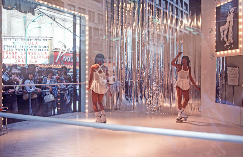 Illinois: Roller Disco fashion show, Chicago (1979) Life in the 1970s in every state, Alabama: Alabama Theatre, Birmingham (1972), Alaska: Fishing on Nonvianuk Lake (1973), Arizona: Route 66, Winslow (1979), Arkansas: Testing for pollution in Fort Smith (1973), California: The streets of San Francisco (c.1970), Colorado: Galena Street, Aspen (1974), Connecticut: Collin’s Diner, Canaan (1976), Delaware: Old State House, Dover (1970), Florida: Disney’s Magic Kingdom (1970), Georgia: Farmer ploughing field in Helen (1970), Hawaii: The Brady Bunch in ‘Hawaii Bound’ (1972), Idaho: Camping on Lake Stanley (c.1970s), Illinois: Roller Disco fashion show, Chicago (1979), Indiana: Indianapolis 500 (1973), Iowa: Sergeant John F. Baker Jr. Bridge, Davenport (1972), Kansas: Grain elevator, White Cloud (1974), Kentucky: Miners’ homes, Brookside (1974), Louisiana: Bourbon Street, New Orleans (1976), Maine: Fishing in Cape Elizabeth (1971), Maryland: School excursion to Baltimore harbor (1973), Massachusetts: Haymarket Square, Boston (1973), Michigan: Annual smelt run, Tawas City (1973), Minnesota: SkyRise Terrace, St Paul (1971), Mississippi: Hurricane Camille Gift Shop, Gulfport (1979), Missouri: Tourist information booth, Lake of the Ozarks, Montana: East Glacier Park train station (1974), Nebraska: Sioux tribal dance, North Platte (1970), Nevada: Fremont Street, Las Vegas (c.1970), New Hampshire: Waterville Valley (1972), New Jersey: Seaside Heights boardwalk (1978), New Mexico: Mesa viewpoint (c.1970s), New York: Sightseeing cruise, New York City (c.1970s), North Carolina: Prom queen parade, Huntersville (c.1970s), North Dakota: Arriving at Fargo station (c.1972), Ohio: Aerial view of Toledo (c.1970s), Oklahoma: Oral Roberts University, Tulsa (c.1977), Oregon: Union Station, Portland (1974), Pennsylvania: Street parade, Philadelphia (1976), Rhode Island: Giant milk can, Lincoln (1978), South Carolina: Jungle Golf, Myrtle Beach (1979), South Dakota: Reptile Gardens Wild Animal Park (1975), Tennessee: Interstate 24 near Nashville (1972), Texas: Dallas freeway (1970), Utah: Dead Horse Point, Canyonlands (1972), Vermont: Farm shop (1975), Virginia: Tysons Corner Mall, Tysons Corner (1976), Washington: Seattle skyline (1973), West Virginia: Laundromat, Cedar Grove (1973), Wisconsin: Lake Mendota (1979)