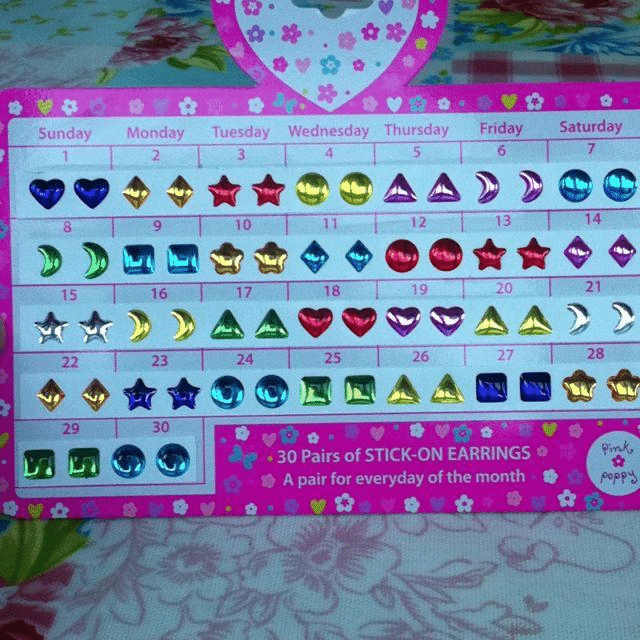 #24: This Exact Set of Stick-On Earrings #1: 10-Color Pens, #3: Scary Stories to Tell in the Dark, #4: Pop-Tarts Crunch, #6: FM Scan Radio, #7: The Talkboy, #9: McDonald’s Cooler at School Functions, #10: Blockbuster Gumball Machine, #12: Polly Pocket, #13: Hard Rock Cafe, #15: McDonalds Hercules plates, #16: Lunchables, #18: This Exact Casserole Dish, #19: Warheads Candy, #21: Crayola Stamp Markers, #22: General Electric Alarm Clock, #24: This Exact Set of Stick-On Earrings, #25: View Master, #27: Blockbuster Membership Card, #28: Hamburger Stools at McDonald’s, #30: Kid Pix Game, #31: Magic Eye Posters, #34: Chuck E. Cheese’s ball pits, #34: Rainbow-Colored Toys “R” Us Plastic Bags
