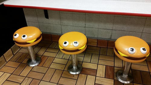 #28: Hamburger Stools at McDonald’s #1: 10-Color Pens, #3: Scary Stories to Tell in the Dark, #4: Pop-Tarts Crunch, #6: FM Scan Radio, #7: The Talkboy, #9: McDonald’s Cooler at School Functions, #10: Blockbuster Gumball Machine, #12: Polly Pocket, #13: Hard Rock Cafe, #15: McDonalds Hercules plates, #16: Lunchables, #18: This Exact Casserole Dish, #19: Warheads Candy, #21: Crayola Stamp Markers, #22: General Electric Alarm Clock, #24: This Exact Set of Stick-On Earrings, #25: View Master, #27: Blockbuster Membership Card, #28: Hamburger Stools at McDonald’s, #30: Kid Pix Game, #31: Magic Eye Posters, #34: Chuck E. Cheese’s ball pits, #34: Rainbow-Colored Toys “R” Us Plastic Bags