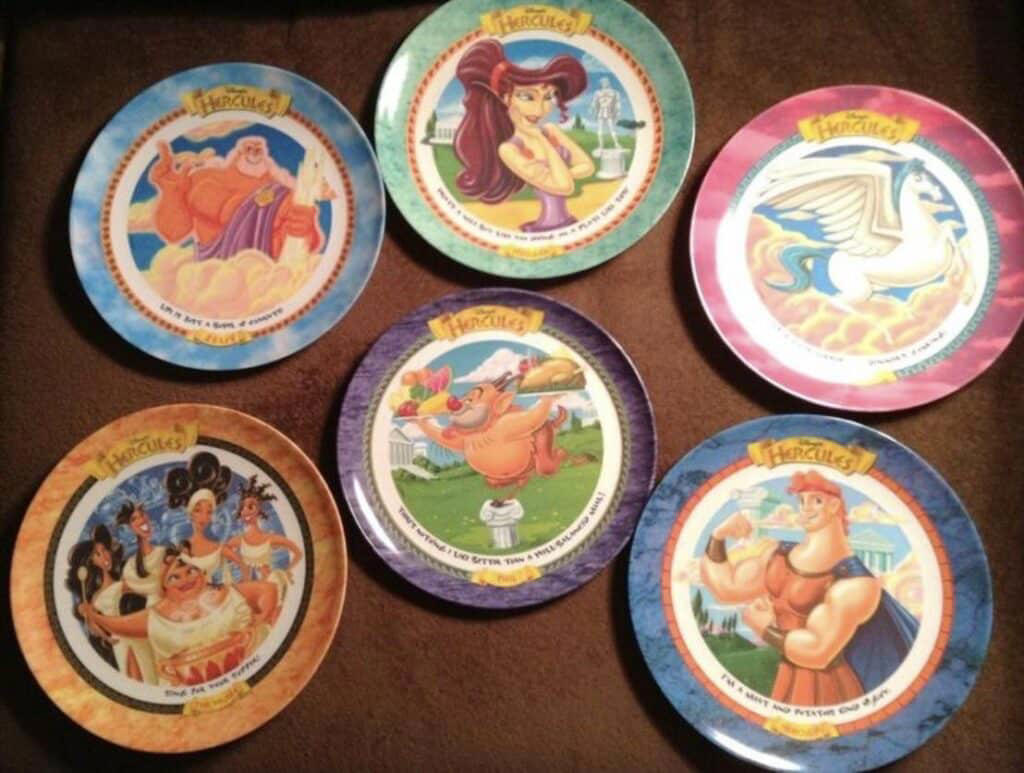 #15: McDonalds Hercules plates #1: 10-Color Pens, #3: Scary Stories to Tell in the Dark, #4: Pop-Tarts Crunch, #6: FM Scan Radio, #7: The Talkboy, #9: McDonald’s Cooler at School Functions, #10: Blockbuster Gumball Machine, #12: Polly Pocket, #13: Hard Rock Cafe, #15: McDonalds Hercules plates, #16: Lunchables, #18: This Exact Casserole Dish, #19: Warheads Candy, #21: Crayola Stamp Markers, #22: General Electric Alarm Clock, #24: This Exact Set of Stick-On Earrings, #25: View Master, #27: Blockbuster Membership Card, #28: Hamburger Stools at McDonald’s, #30: Kid Pix Game, #31: Magic Eye Posters, #34: Chuck E. Cheese’s ball pits, #34: Rainbow-Colored Toys “R” Us Plastic Bags