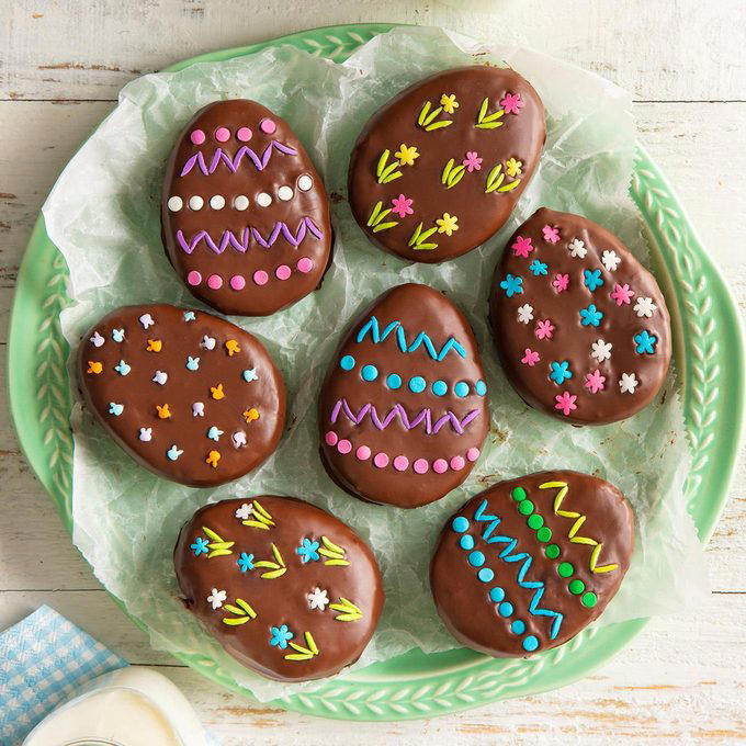 Build an Easter Candy Charcuterie Board, Braid an Easter Bread, Make a New Twist on a Bunny Cake, Dip Homemade Peanut Butter Eggs, Add Springtime Flair to the Table, Host Brunch, Dye Eggs, Build a Nest, Play a Few Games, Create a Unique Centerpiece, Turn Carrot Cake on Its Head, Arrange Fresh Flowers, Turn Easter into Teatime, Stir Up a Signature Easter Cocktail, Serve All Kinds of Deviled Eggs, Make Adult Easter Baskets, Bake an Easter Ham, Try a New Easter Craft, Create a Towering Dessert, Use the Good China, Decorate a Lamb Cake, Create Flower Pot Favors or Place Cards, Bake Resurrection Rolls, Go Back in Time, Dye Eggs the Natural Way, Fill Eggs for Everyone, Bake Hot Cross Buns, Add a Butter Lamb to the Table, Try Easter Lamb, Send Home Care Packages, Smash an Easter Piñata, Decorate an Easter Tree, Make a Festive Easter Wreath, Hide Bunnies Around the House, Get Creative with Peeps