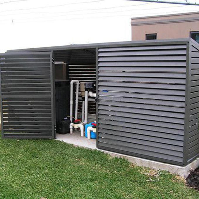 Hide AC Unit with a Living Garden AC Cover, Hide AC Unit with a Modern Outdoor AC Cover, AC Cover/Tool Shed, Hide AC Unit with Tall Shrubs, Hide AC Unit with Birdhouse Picket Fence, Hide AC Unit with a Shabby Chic Shutter Screen, Hide AC Unit with an Iron Trellis, Hide AC Unit with a Multi-Purpose Structure, Hide AC Unit with an Outdoor Privacy Screen