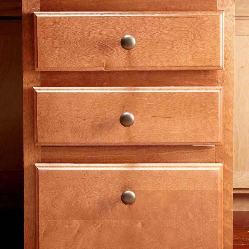 Install Hardware Higher on the Lowest Drawer 13 Tips To Install Cabinet Hardware Perfectly Every Time Gettyimages 1389698183 Ft, Use the Door Rail as a Guide, Hide Old Holes With Back Plates, Make a Simple Drawer Template, Two-Sided Templates Prevent Tear-Out, Use Thread Sealant to Keep the Screws Tight, Mix Putty to Match, Install Hardware Higher on the Lowest Drawer, Perfect Finish Touch-Ups