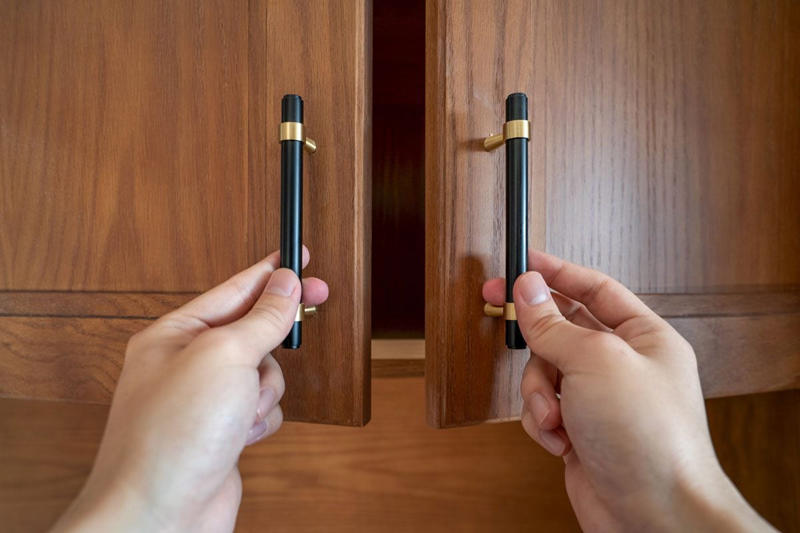 13 Tips To Install Cabinet Hardware Perfectly Every Time Gettyimages 1389698183 Ft 13 Tips To Install Cabinet Hardware Perfectly Every Time Gettyimages 1389698183 Ft, Use the Door Rail as a Guide, Hide Old Holes With Back Plates, Make a Simple Drawer Template, Two-Sided Templates Prevent Tear-Out, Use Thread Sealant to Keep the Screws Tight, Mix Putty to Match, Install Hardware Higher on the Lowest Drawer, Perfect Finish Touch-Ups