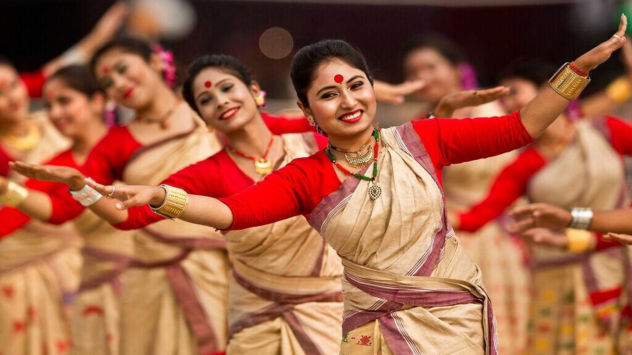 Bihu, Assam | The Bihu festival is one of India's most celebrated harvest festivals and the most significant of all the colourful and cultural events in Assam. During the month of April. The festival is celebrated with bullfights, bird fights, and burning Mijis—temporary tents constructed of bamboo, hay, and wood, along with dance and music programs. This year, Bohag Bihu will begin on April 14 and last about a week, ending on April 20. (Image: AP)