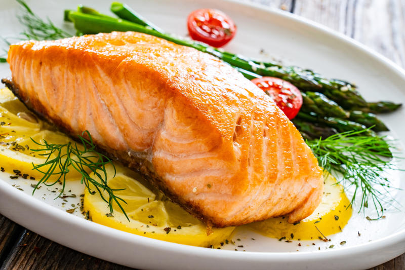 In your 20s: foods with protein, In your 20s: complex carbohydrates, In your 20s: calcium-rich foods, In your 20s: iron-rich foods, In your 30s: bok choy, In your 30s: fatty fish, In your 40s: bright fruits and vegetables, In your 40s: whole grains, In your 50s: high-fiber vegetables, In your 50s: turmeric, In your 50s: plant-based protein, In your 50s: eggs, In your 60s and beyond: olive oil, In your 60s and beyond: berries